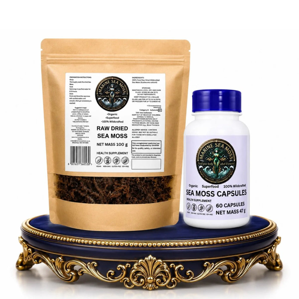 A Marine Sea Moss product bundle featuring a Raw Dried Sea Moss pouch and Sea Moss Capsules bottle displayed on a gold and blue pedestal against a white background
