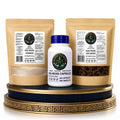 The Infinite Sea Moss Tier Bundle featuring a Marine Sea Moss Powder pouch, a Sea Moss Capsules bottle, and a Raw Dried Sea Moss pouch displayed on a decorative gold and blue pedestal