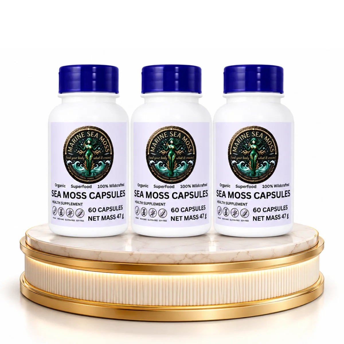 Three bottles of Marine Sea Moss Capsules on a gold and marble pedestal 