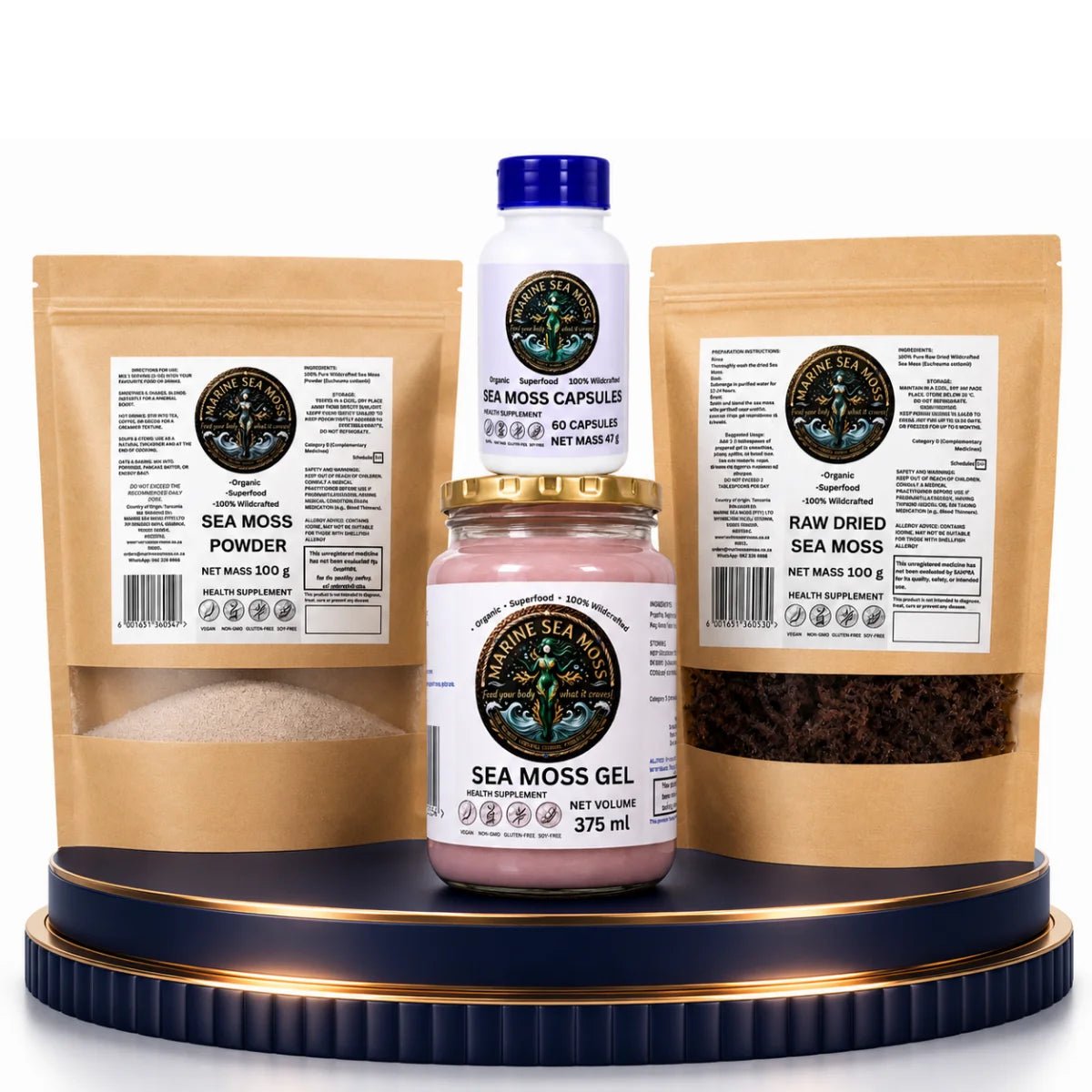 The Ultimate Marine Sea Moss Bundle featuring a Sea Moss Powder pouch, Sea Moss Gel jar, stacked Sea Moss Capsules bottle, and a Raw Dried Sea Moss pouch on a decorative blue and gold pedestal