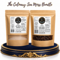 Two stand-up pouches from Marine Sea Moss, featuring sea moss powder and raw dried sea moss, displayed elegantly on a navy and gold tray against a white background. This Culinary Sea Moss Bundle offers premium, wildcrafted superfoods for daily wellness.